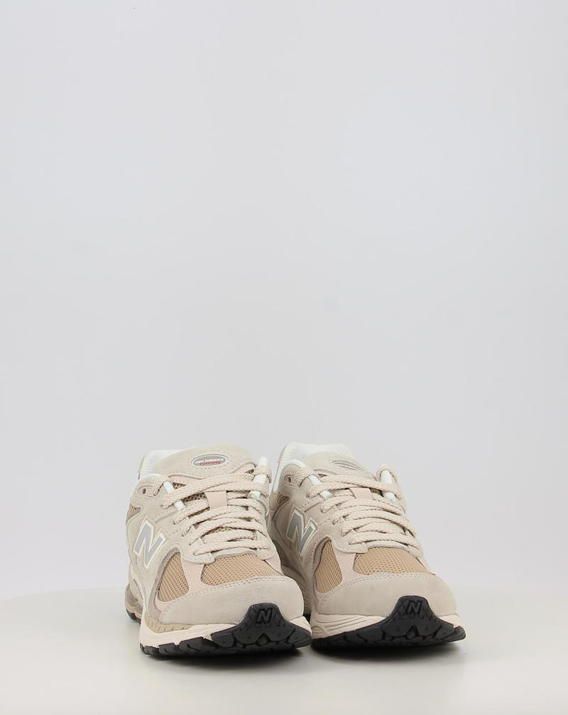 Baskets NEW BALANCE U2002RB beige